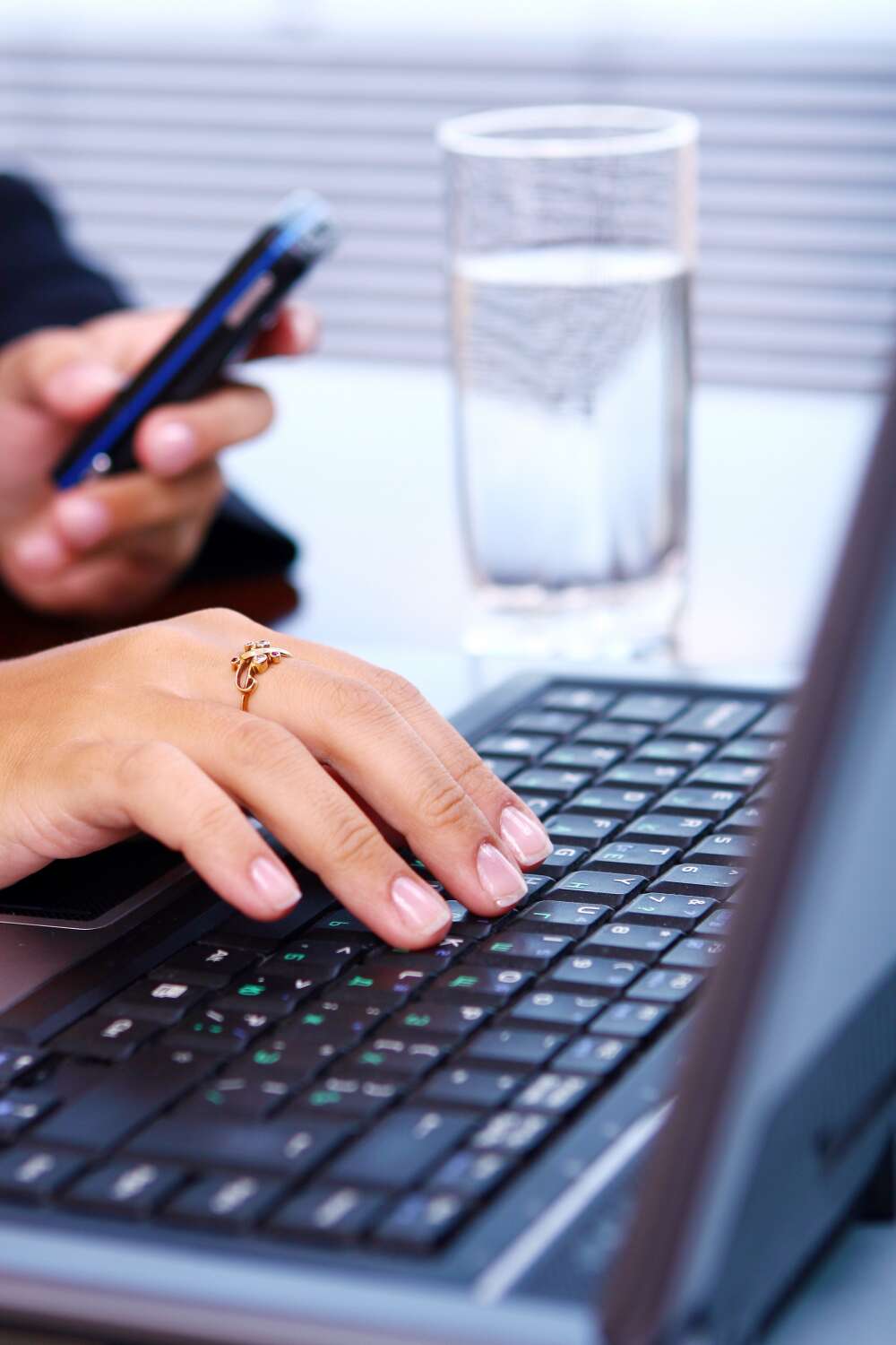 woman-hands-laptop-keyboard